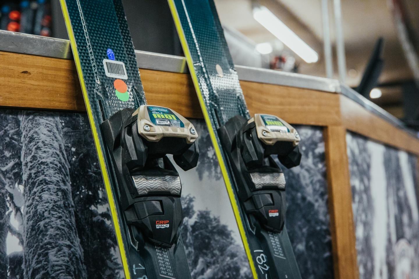 skis leaning against a counter