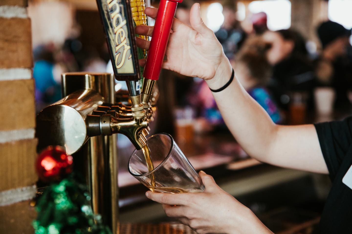 bartender pouring beer