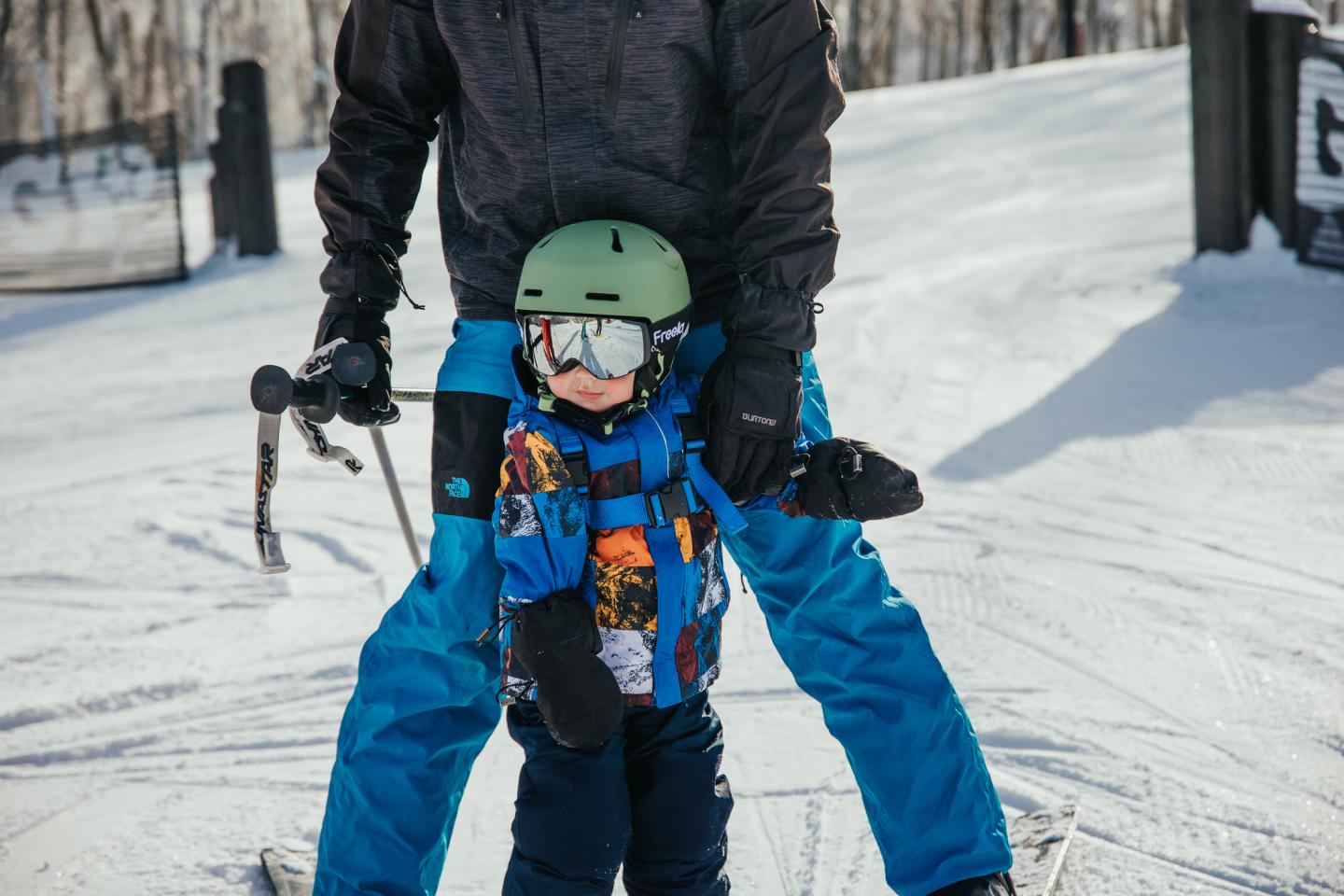 adult and child skiers
