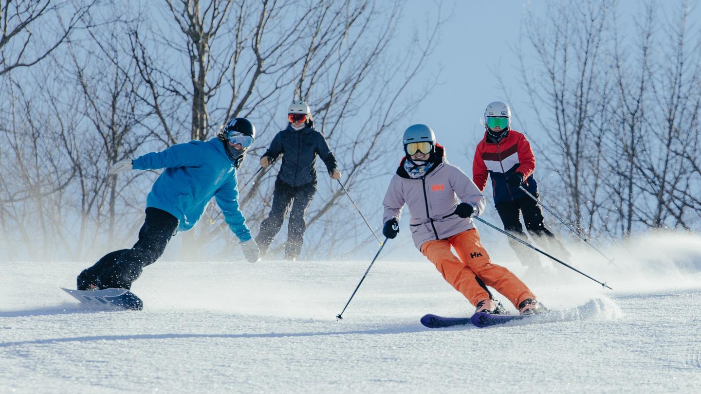 Four Skiers