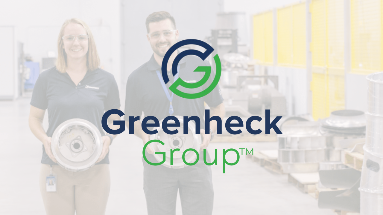 Greenheck Group logo with two smiling people holding metal objects in a workshop.