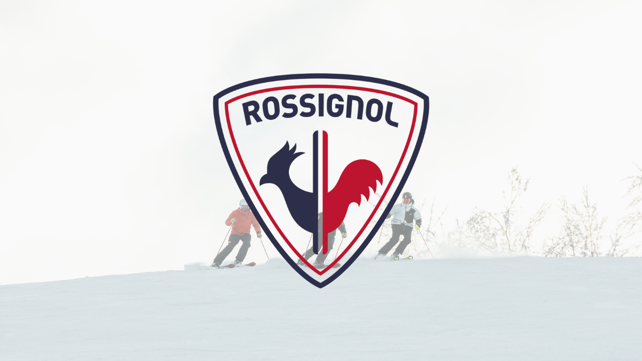 Rossignol logo over skiers on a snowy slope.