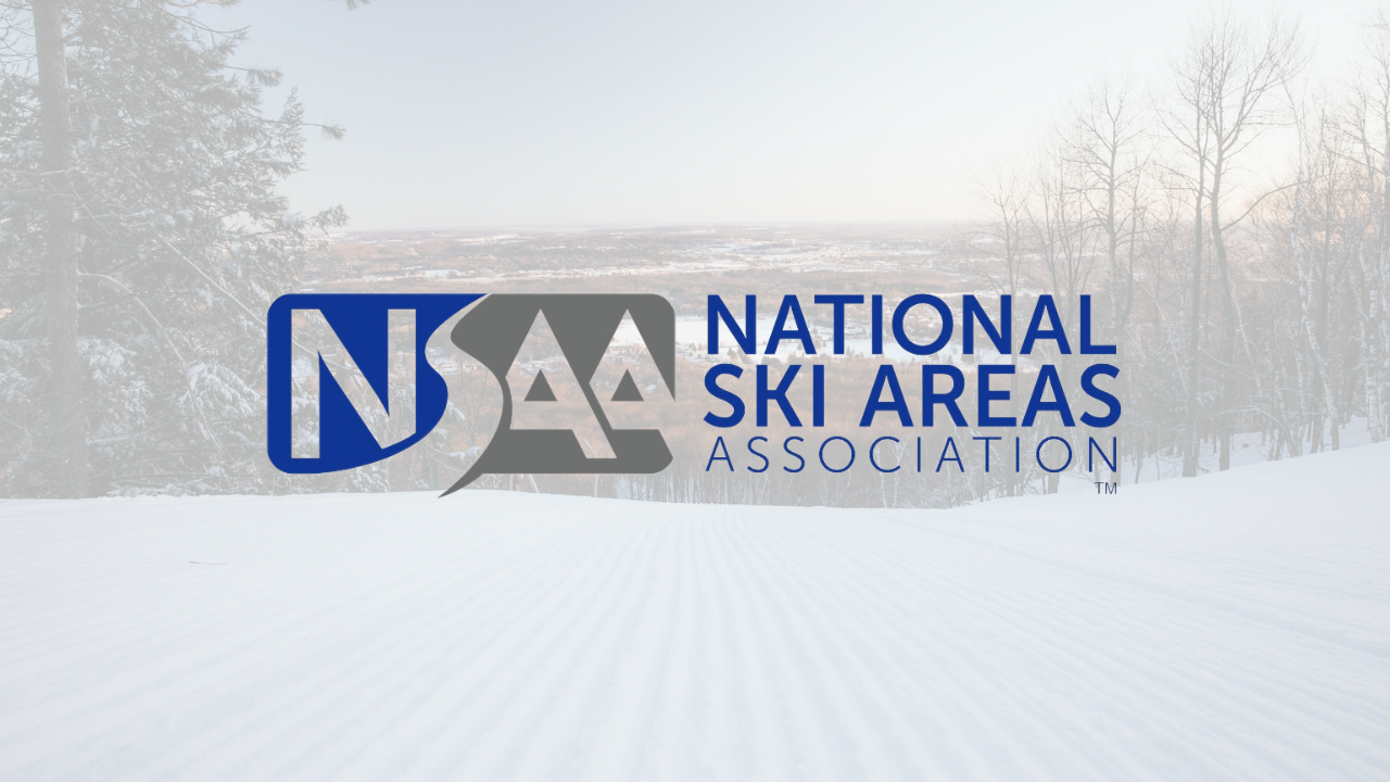 NSAA logo over a snowy ski slope backdrop.