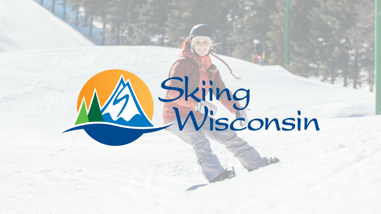 Skier on snowy slope with "Skiing Wisconsin" logo.