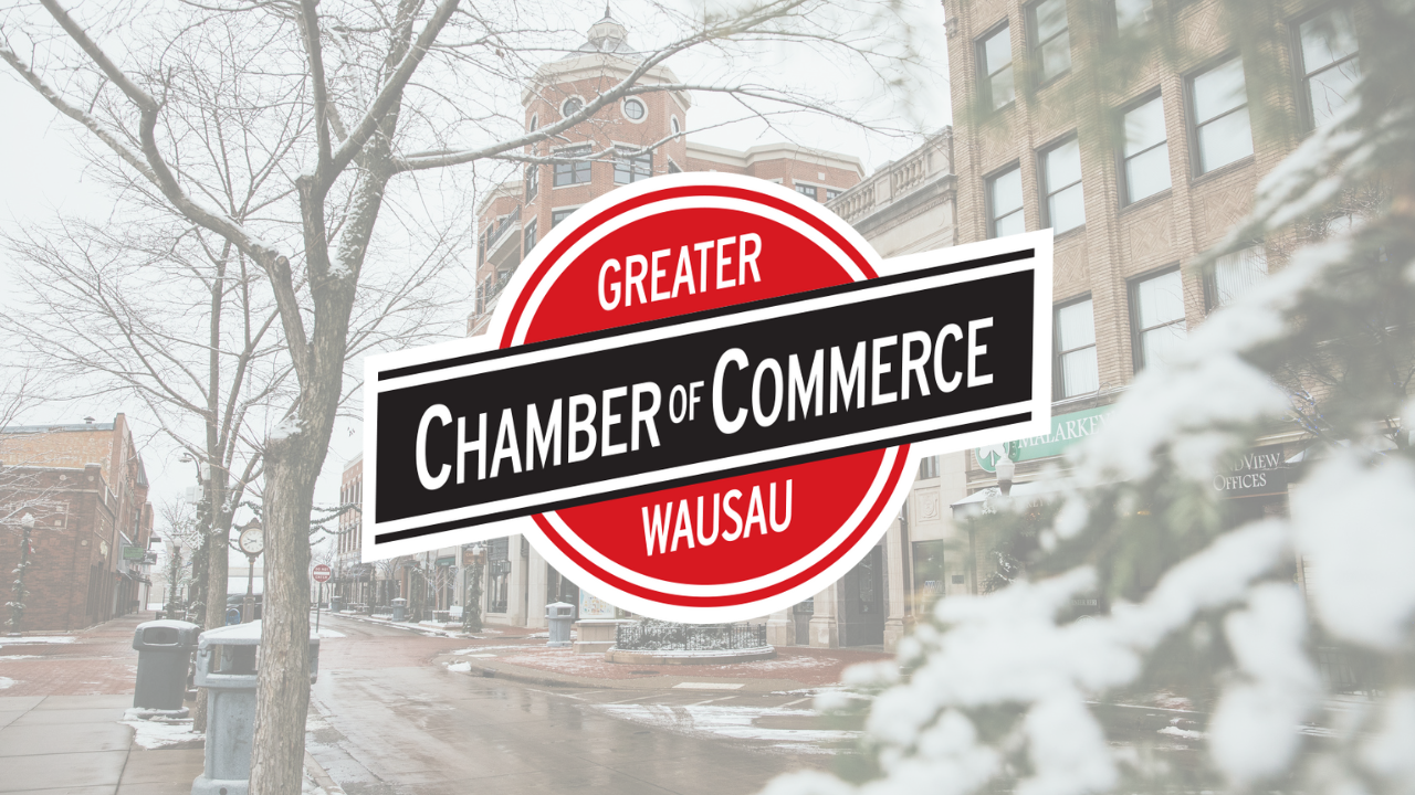Greater Wausau Chamber of Commerce logo over snowy street scene.